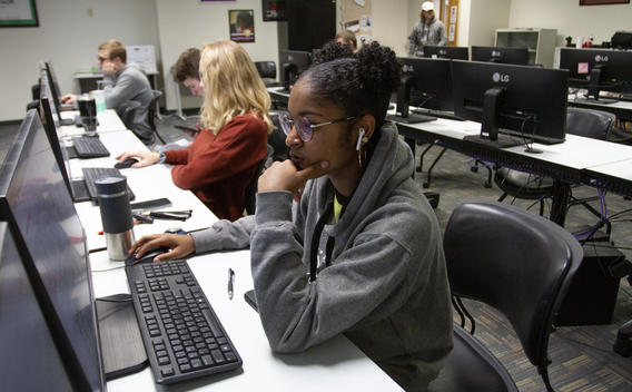 Web development student learning how to code